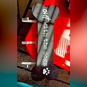 Out with dogs bone sign